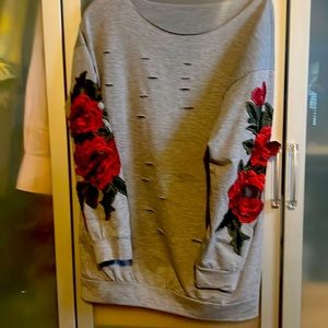 Very soft worn a couple times size medium, long sleeve top